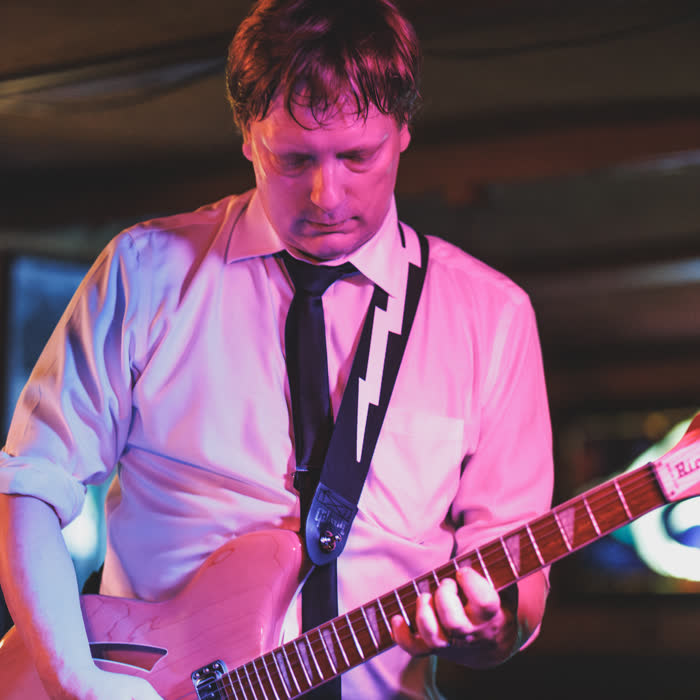 TJ Wark playing a Rickenbacker